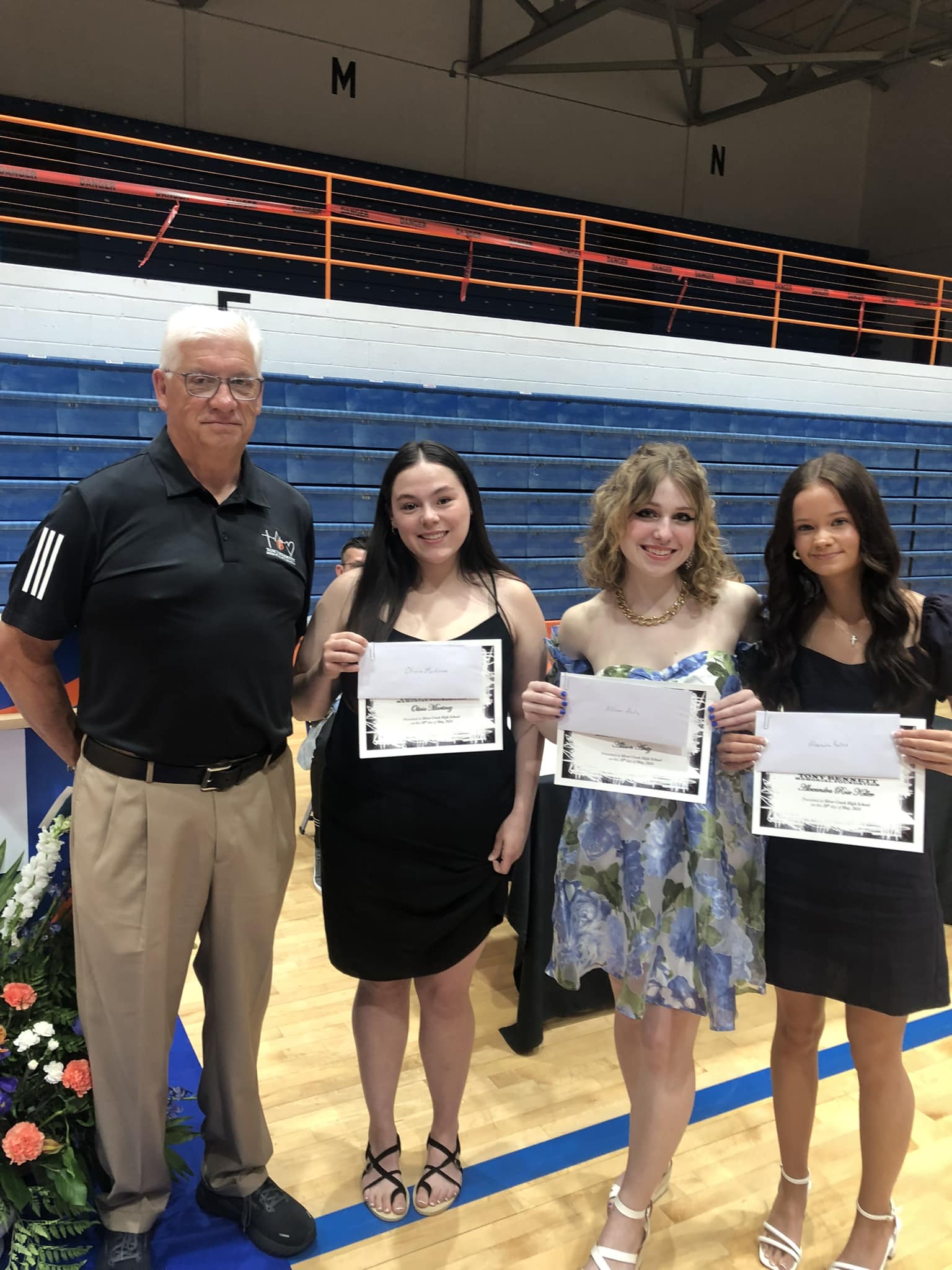 Silver Creek student accepting scholarship.